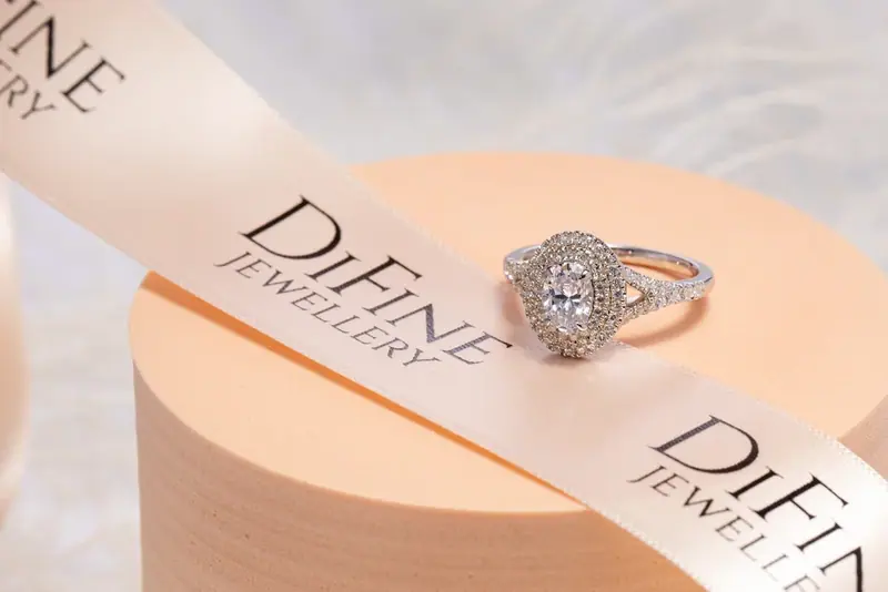 Diamond ring on a jewellery brand presentation box