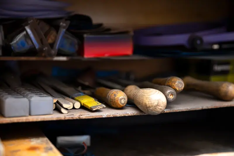 Rows of jeweller's tools on a workshop shelf