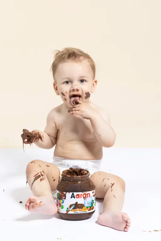 Smash cake birthday session photographed by Darina Photography in Barnet, North London