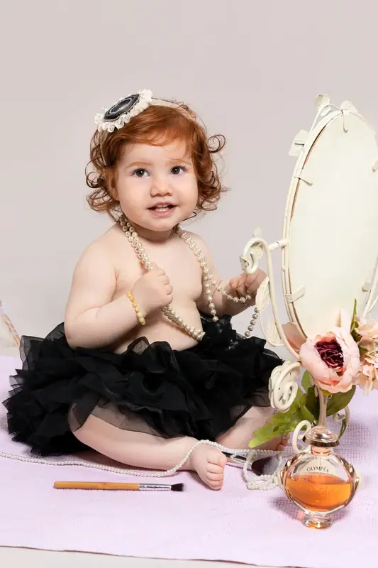 Smash cake birthday session photographed by Darina Photography in Barnet, North London