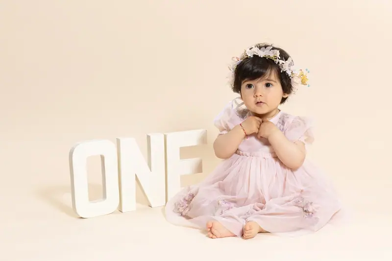 Smash cake birthday session photographed by Darina Photography in Barnet, North London